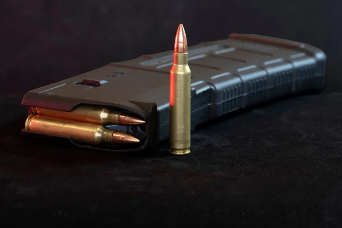 Rifle magazine and cartridges