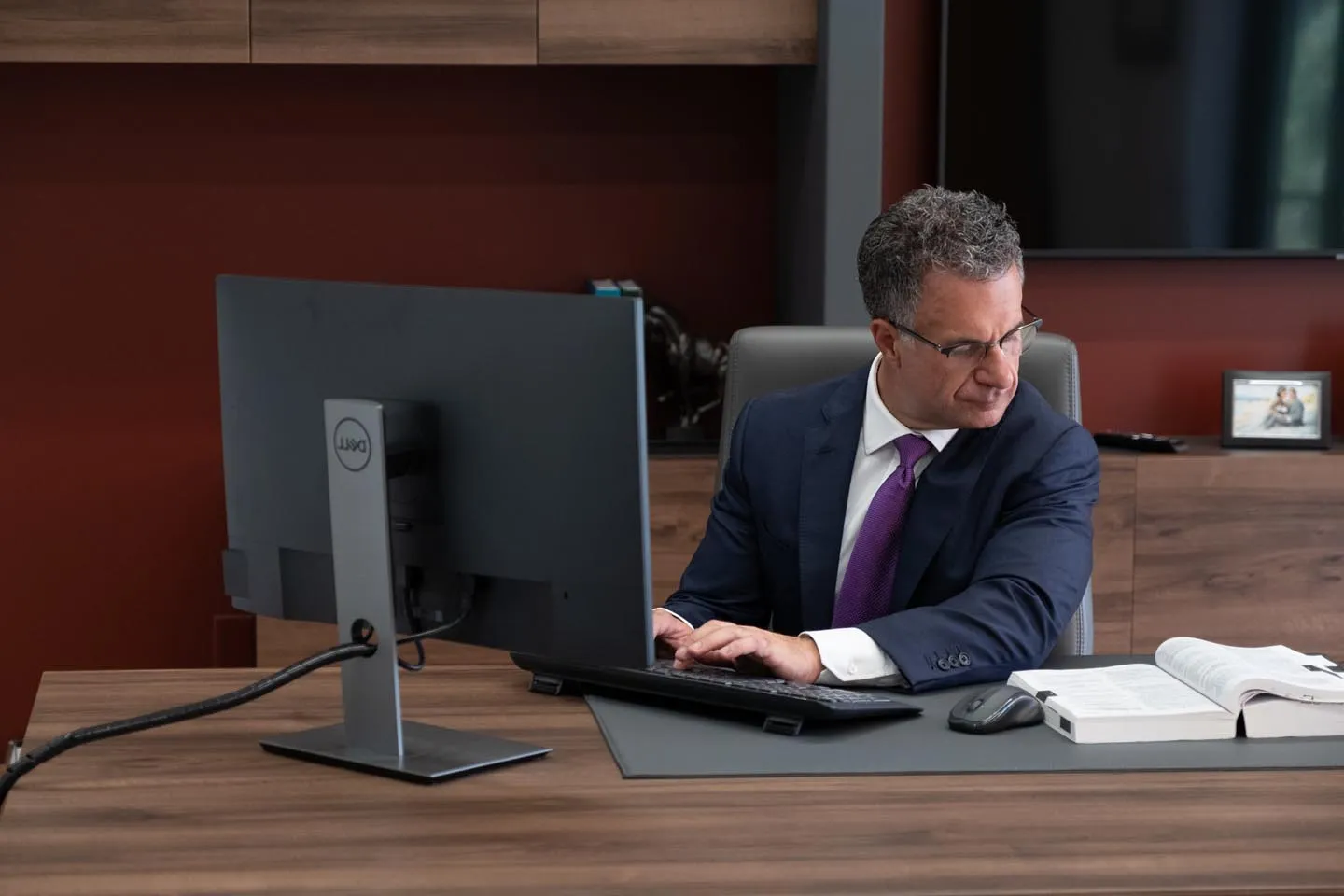 Attorney working at his computer
